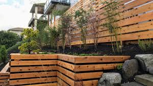 Let's look at some other horizontal fence designs… here is a very modern automatic fence gate using gray horizontal composite planks to create a unique commercial fence. Portland S Horizontal Fence Screen Experts