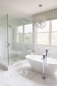 The freestanding tub along with vessel sinks look beautiful together. Check Out This Bathroom Remodel We Just Completed We Used All The Ferguson Exclusives Victor Bathroom Shower Design Master Bathroom Design Bathrooms Remodel