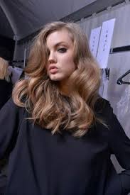 The dark brown beautifully blends into a light, almost blonde color. New Hairstyle 2014 November 2016