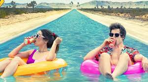 While stuck at a wedding in palm springs, nyles (andy samberg) meets sarah (cristin milioti), the maid of honor and family black sheep. Palm Springs Movie Review The Mad Movie Man