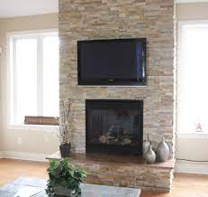 Stone fireplace with tv above | stone fireplaces add warmth and style to the modern home. Split Stone Fireplace With Tv Modern Family Room Detroit By Realstone Systems Houzz