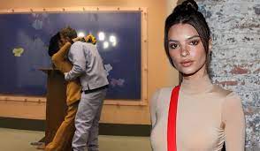 Model emily ratajkowski wowed in a peach dress when she was a bridesmaid for a friend. Emily Ratajkowski Marks Wedding Anniversary With Topless Snap