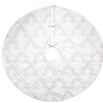 This skirt has fabric tie closures, and a full fabric underlay to catch pine needles and ornaments. White And Gold Tree Skirt Wayfair