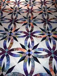 Bali Wedding Star Quiltworx Com Made By Millie Bires Double Wedding Ring Quilt Quilts Wedding Ring Quilt