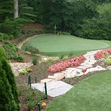 In the process of installing a practice putting green in your backyard, you may need to prepare the area first by leveling it. Backyard Putting Greens Reviewing Real Vs Artificial Putting Greens Neave Group