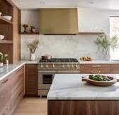 Tinkering with some design ideas for this mid-century, modern kitchen, with walnut cabinet… [Video] | Modern kitchen remodel, Modern walnut kitchen, Walnut kitchen cabinets