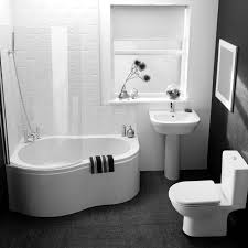 It is accompanied by a curved vanity with dual sink and wooden framed mirror. Corner Bathtub Shower How To Choose The Best Ideas On Foter