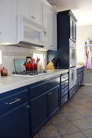 navy and white kitchen cabinet painting