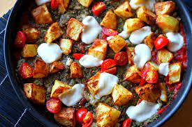 Baharat Roasted Potatoes With Aubergine And Spinach Deena Kakaya Vegetarian Recipes Cooking Vegetarian Recipes Roasted Potatoes Recipes
