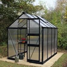 Une telle serre peut constituer un véritable élément de décoration pour le jardin, selon le modèle choisi. Serre De Jardin 4 97m En Verre Trempe Burford Noire Eden Greenhouses Maison Verte Petite Serre Serre Jardin