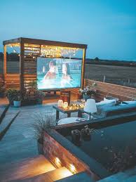 In spain rooftop apartments are often smaller than the lower apartments. As You Most Likely Picture Developing Your Very Own Rooftop Garden Is Not As Easy As Growing Bushes In Th Rooftop Terrace Design Rooftop Design Outdoor Cinema