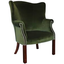 Vintage upholstered green velvet armchair with a high wing. Ralph Lauren Compact Wingback Armchair In English Riding Green Velvet At 1stdibs