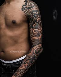 Logan aguilar works out of last rites tattoo theatre in nyc. Japanese Tattoo George Bardadim Tattoo Artist Nyc Japanese Tattoo Dark Skin Tattoo Japanese Sleeve Tattoo