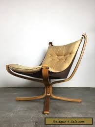 Super retro mid century sling chair and sofa, a real statement piece. Vintage Mid Century Danish Modern Leather Falcon Sling Chair By Sigurd Ressell For Sale In United States