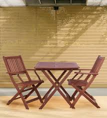Compact folding leaf dining table and four matching brown chairs. Buy Honour 2 Seater Foldable Dining Set In Natural Brown Finish By Aura Online Patio Sets Tables Furniture Pepperfry Product