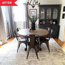 The round table has a wide pedestal beneath the thick top. Https Www Thekitchn Com Dining Room Furniture Paint Inspiration Black 23084729 Newsl Black Dining Room Black Dining Room Furniture Dining Room Furniture Redo