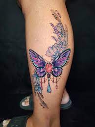 Butterfly Gem Tattoo Done By Me Jennifer Jackal At International Ink In Stevens Point Wi Gem Tattoo Butterfly Tattoo Tattoos