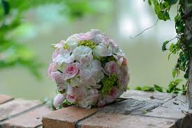 Brides wedding bouquet in pink and white. Hd Wallpaper Pink And White Rose Bouquet On Brown Bricks Wedding Flowers Wallpaper Flare