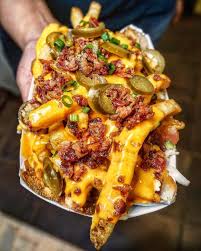 For an over the top recipe check out these pulled pork loaded waffle fries! Yumm Loaded Cheese Fries With Bacon And Jalapeno
