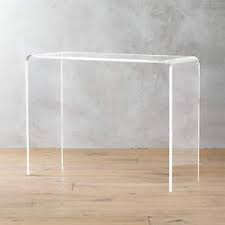 Does the table have a. 3 Piece Peekaboo Acrylic Nesting Table Set Reviews Cb2