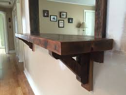 It will make your home more livable, add functionality to your rooms, and it is essentially a big window opening where the base of the pass through is often a counter set at bar height (about 42 inches). Kitchen Pass Through With Reclaimed Bar And Trim Rustic Home Bar Portland Maine By Bondeko Houzz
