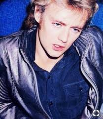 Look at how gorgeous Roger Taylor's eyes are