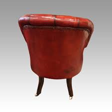 The pillow doesn't come with, but the ottoman does! Victorian Red Leather Reading Chair Hingstons Antiques Dealers