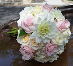 Elegant white calla lilies are simply accented by phoenix palm leaves to. Keeping It Simple But Elegant Bridal Bouquet