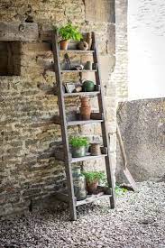 10 Easy Pieces Stepladder Plant Stands Gardenista Rustic Wooden Shelves Garden Storage Wooden Ladder Shelf
