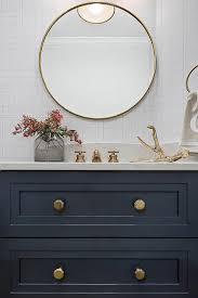 May 22, 2021 · notice below, where the images show the vanity with a door closed (preventing light from coming in) and then an image with all doors and windows open. Navy Blue Vanity Brass Hardware Design Ideas