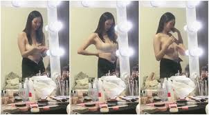 尼克成人網[走光偷拍] - 更衣室偷拍車展女模~身材真的很辣耶