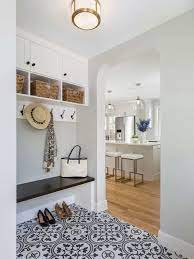 Small entryway spring flowers country white farmhouse style. 17 Design Inspirations For Mudrooms And Entryways Entryway Tile Floor Entryway Tile Small Entryways