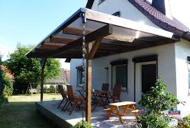 Ein Holz Terrassendach Der Marke Rexocomplete 6m X 4m Mit Stegplatten In Bronze Als Farbe Fur Die Hol Terrassenuberdachung Uberdachung Terrasse Uberdachungen