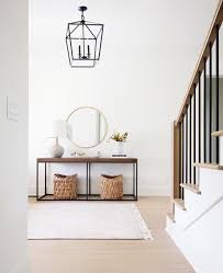 Foyer console table under stairs. How To Style An Entryway Table Plank And Pillow