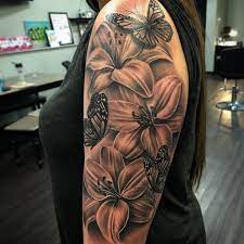 Tattoo Artist On Instagram Lilies And Butterflies For Appointments Email Joannakcee Lily Tattoo Sleeve Butterfly Tattoos On Arm Arm Sleeve Tattoos For Women