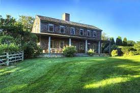 Newport S 345 Year Old Rocky Farm Has A Barn Style Roof Wood Shingle Siding And Roofing A Central Ch Farmhouse Architecture Maine House Wood Shingle Siding