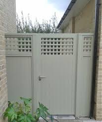 Solid Painted Gate With Trellis Top Fence Design Garden Fence Garden Design