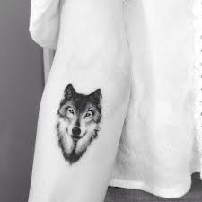 Black And Grey Realism Wolf Tattoo 50 Of The Most Beautiful Wolf Tattoo Designs The Internet Has Ever Seen Wolf Tattoos For Women Small Wolf Tattoo Small Tattoos For Guys
