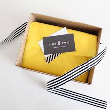 Black And Yellow Logo Design Branding Package Design Yellow Black And White Kraft Box Tissue Paper Striped Logo Kraft Box Packaging Jewerly Packaging Box Packaging Design