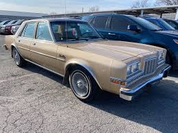 Image result for Beige 1984 Plymouth