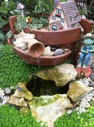 Add realistic waves and other surface effects. Miniature Fairy Garden With Water Feature Easy Garden Rock Garden Miniature Garden