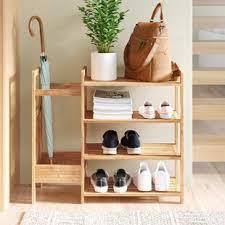 Cabinets on either side of this hall tree feature adjustable shelves, making room for shoes, skateboards and sundry items of all shapes and sizes. Narrow Shoe Storage Bench Off 70