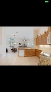 Living room or family room, dining room, foyer, hallway gray paint is everywhere these days! Will Agreeable Gray Paint Color Match This Kitchen