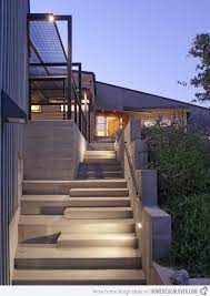 As you can see, the wooden steps of the stair stand upon single metal support, with metallic railings to the side. 15 Concrete Exterior Staircase Design Home Design Lover Exterior Stairs Staircase Design House Exterior