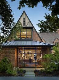 You've heard the names before, of course: Tudor Home Features A Stunning Modern Twist On Lake Washington