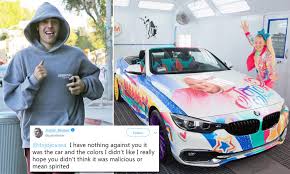 The bmw coup convertible featured a personalized rainbow wrap. Justin Bieber Apologizes After Seeming To Shade Youtuber Jojo Siwa S Customized Bmw Daily Mail Online