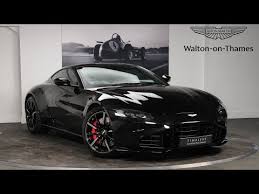 Image result for Onyx Black 2011 Aston Martin
