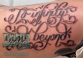 I've already written about my nostalgia for nineties tattoos, but now i'm going to focus on a trend which is very current. Grendel To Infinity And Beyond Lettering Script Toy Story Disney