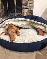 No matter the season, your furry friend will love to lounge on this cushy quilted mat, perfect for use as a crate pad or dog bed. Snoozer Luxury Cozy Cave Dog Bed 28 Colors Fabrics 3 Sizes Cozy Cave Dog Bed Cave Dog Bed Cool Dog Beds
