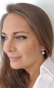 Freshwater Pearl Earrings Hanging From Sterling Silver and Cubic Zirconia  Round Ear Posts.